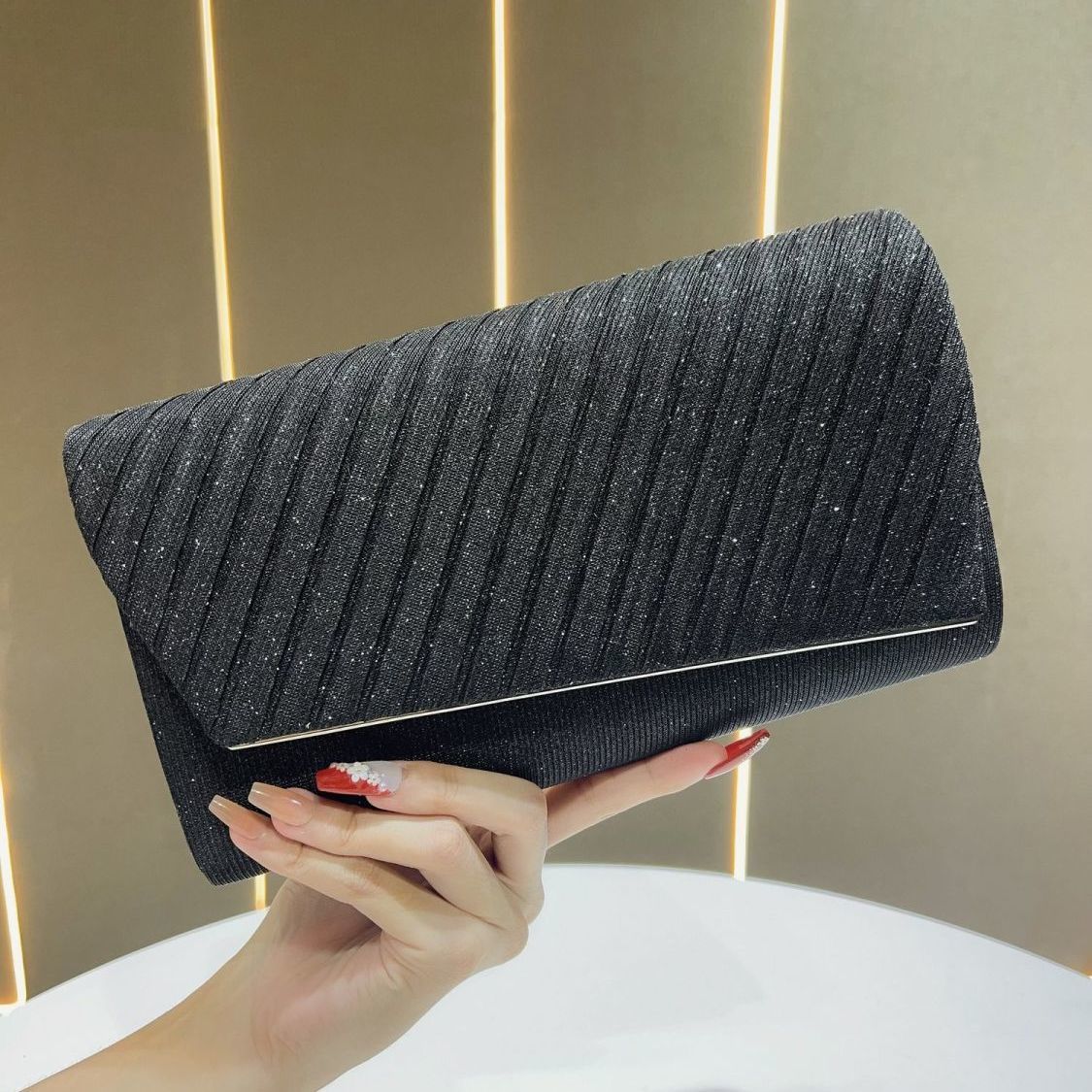 Shimmering Pleated Envelope Clutch