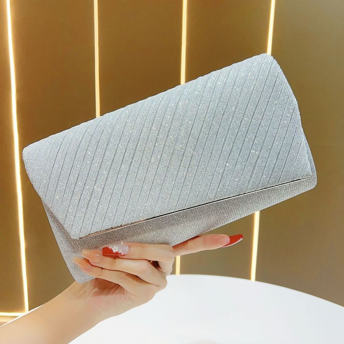Shimmering Pleated Envelope Clutch