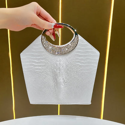 White croc-embossed handbag with crystal ring handle