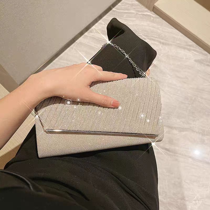 Shimmering Pleated Envelope Clutch