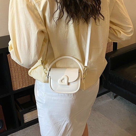 Heart-Buckle Mini Saddle Crossbody Bag