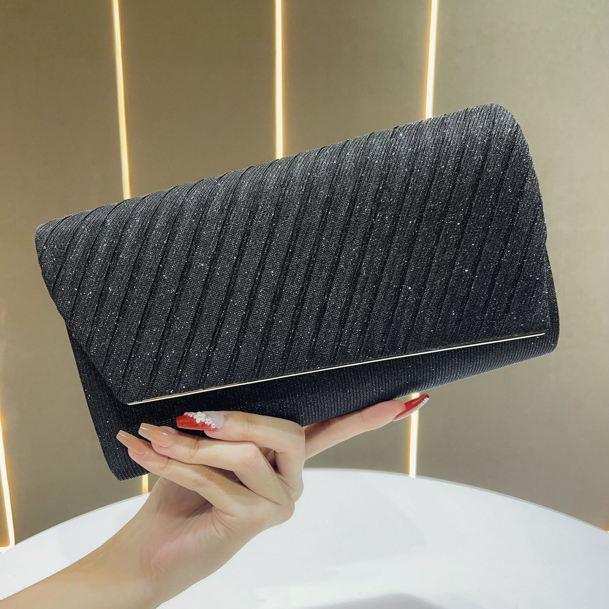Shimmering Pleated Envelope Clutch