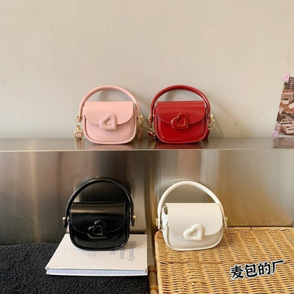 Heart-Buckle Mini Saddle Crossbody Bag