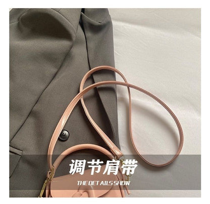 Heart-Buckle Mini Saddle Crossbody Bag