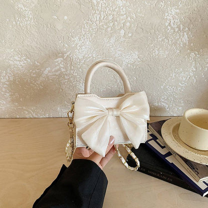 Pink Bow Mini Top-Handle Crossbody Bag