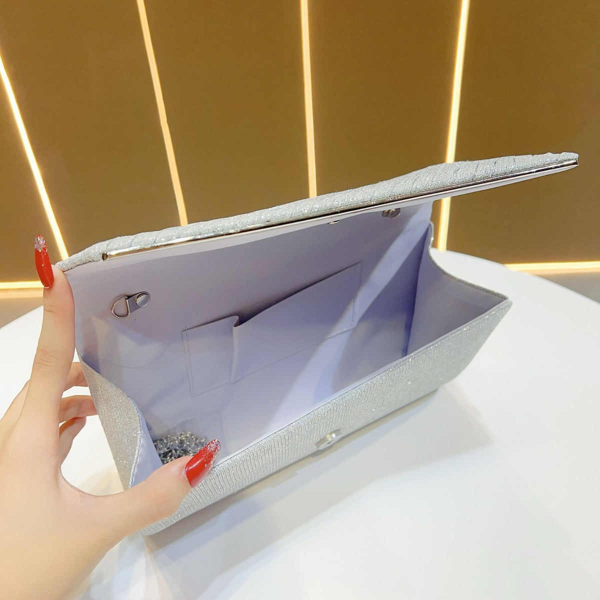 Shimmering Pleated Envelope Clutch