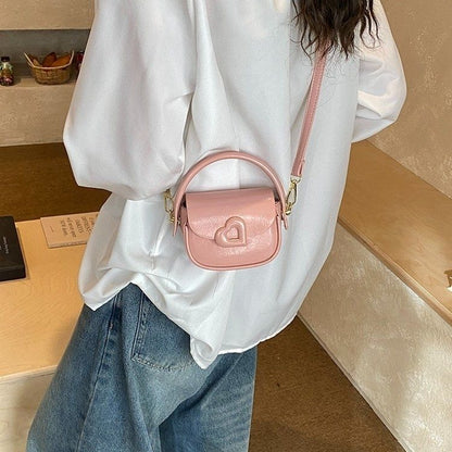 Heart-Buckle Mini Saddle Crossbody Bag