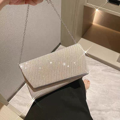 Shimmering Pleated Envelope Clutch